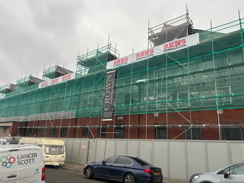 Bens Demolition Division job Reclaim roof boards /bricks for re-use. Erect site  hoarding remove steel chimney photo number 7