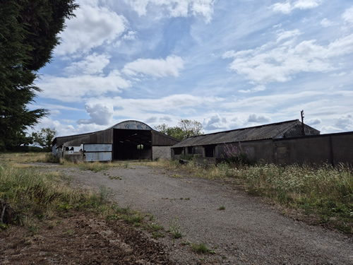 Bens Demolition Division job Careful demolition of farm outbuildings that includes removal of asbestos roof photo number 2