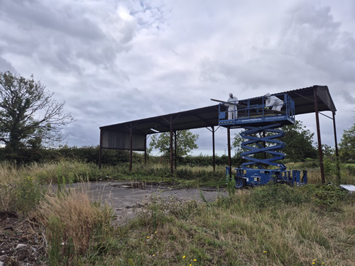Bens Demolition Division job Careful demolition of farm outbuildings that includes removal of asbestos roof photo number 3