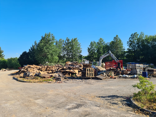 Bens Demolition Division job Uplifting a car park that includes 20000 square metres of tarmac, kerb stones, tree protection hoarding, also crushing the aggregate on site and removing for recycling. photo number 4