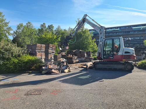 Bens Demolition Division job Uplifting a car park that includes 20000 square metres of tarmac, kerb stones, tree protection hoarding, also crushing the aggregate on site and removing for recycling. photo number 6