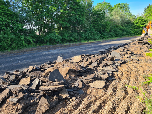 Bens Demolition Division job Uplifting a car park that includes 20000 square metres of tarmac, kerb stones, tree protection hoarding, also crushing the aggregate on site and removing for recycling. photo number 7