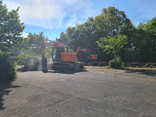 Bens Demolition Division job Uplifting a car park that includes 20000 square metres of tarmac, kerb stones, tree protection hoarding, also crushing the aggregate on site and removing for recycling. photo number 8