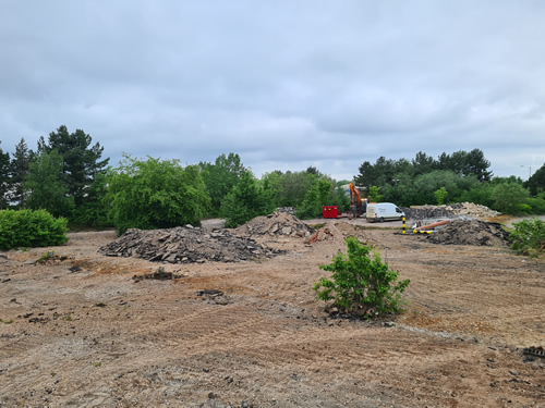 Bens Demolition Division job Uplifting a car park that includes 20000 square metres of tarmac, kerb stones, tree protection hoarding, also crushing the aggregate on site and removing for recycling. photo number 12