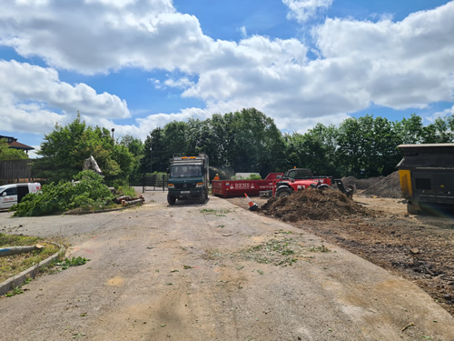 Bens Demolition Division job Uplifting a car park that includes 20000 square metres of tarmac, kerb stones, tree protection hoarding, also crushing the aggregate on site and removing for recycling. photo number 14