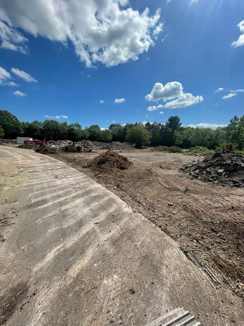 Bens Demolition Division job Uplifting a car park that includes 20000 square metres of tarmac, kerb stones, tree protection hoarding, also crushing the aggregate on site and removing for recycling. photo number 24