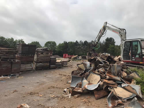 Bens Demolition Division job Uplifting a car park that includes 20000 square metres of tarmac, kerb stones, tree protection hoarding, also crushing the aggregate on site and removing for recycling. photo number 25