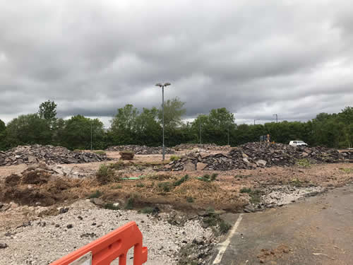 Bens Demolition Division job Uplifting a car park that includes 20000 square metres of tarmac, kerb stones, tree protection hoarding, also crushing the aggregate on site and removing for recycling. photo number 27