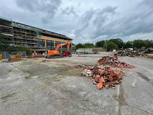 Bens Demolition Division job Uplifting a car park that includes 20000 square metres of tarmac, kerb stones, tree protection hoarding, also crushing the aggregate on site and removing for recycling. photo number 28