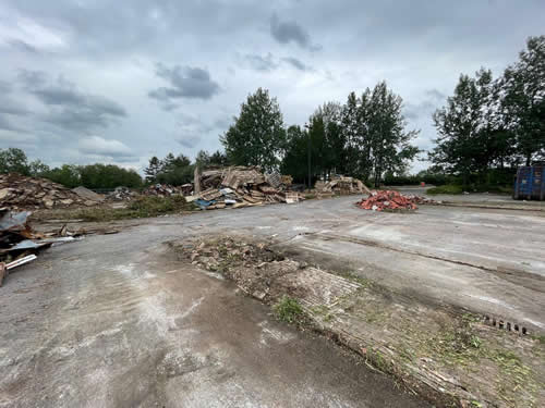Bens Demolition Division job Uplifting a car park that includes 20000 square metres of tarmac, kerb stones, tree protection hoarding, also crushing the aggregate on site and removing for recycling. photo number 30